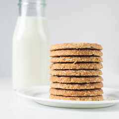 Fototapeta na wymiar Stack of oat cookies, homemade oatmeal cookies, stack of thin oat biscuits