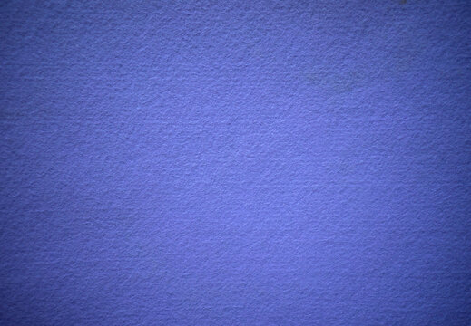 Purple texture of soft cardboard. Pure purple background. A clean place for a congratulatory text. Photo of felt fabric.