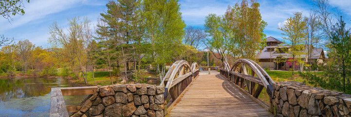 Wood bridge and walking trails at Lincoln Woods State Park near Providence, Rhodes Island, USA,...