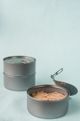 Food can opened on blue background