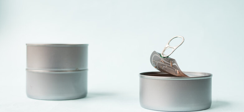 Food can opened on blue background