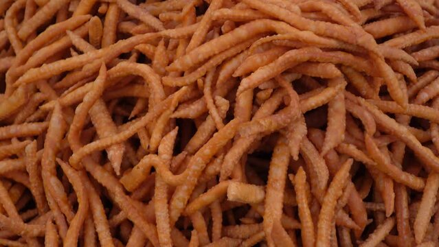 Kucho Nimki (Brown Color), handmade crunchy salty snack food. Locally called Namak para. Bangla Pohela Baishakh fair's traditional food.