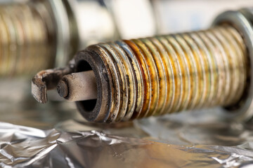 old very damaged car spark plugs
