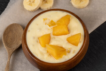 natural yogurt with pieces of fruit and banana flavor