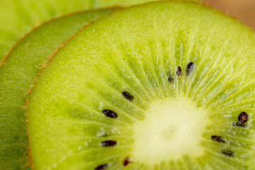 fresh green kiwi while cooking food in the kitchen