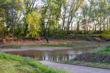 boat ramp on Lamine River in early spring at Roberts Bluff Access near Blackwater, Missouri