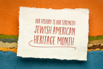 Our history is our strength - Jewish American Heritage Month - handwriting on a sheet of watercolor...