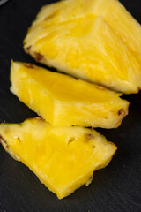 Sliced delicious ripe pineapple yellow, close up