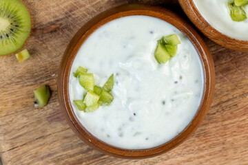 Delicious Fresh Cow's milk Yogurt with Kiwi slices