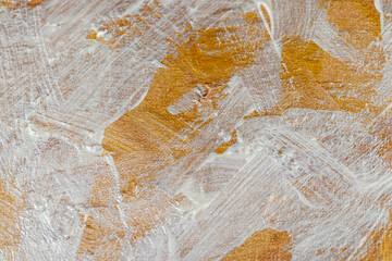 Abstract background painted with yellow and white paints