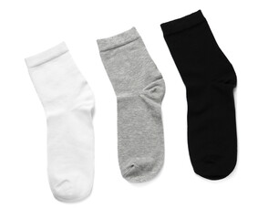 Different socks isolated on white, top view