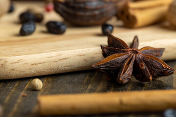 Different types of spices scattered on the table during cooking