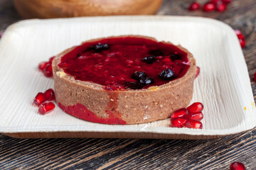sweet dessert of chocolate cake with cream and berry flavor
