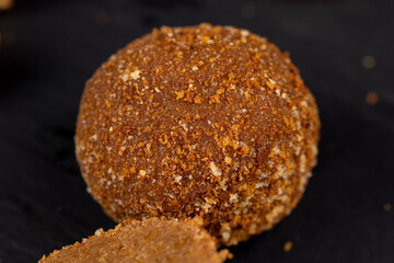 delicious round chocolate candy made of cocoa and sugar