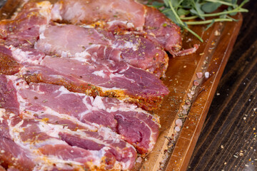 Pork meat pieces marinated with spices and salt