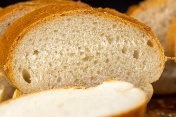 Sliced soft French baguette made of wheat flour