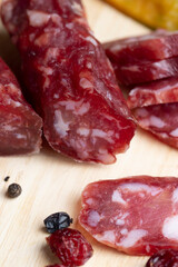 sliced sausage from pieces of meat with bacon