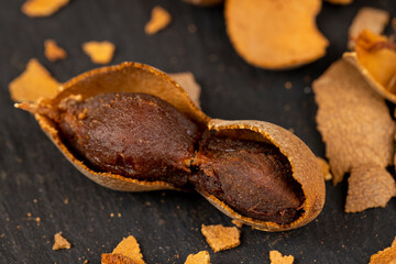open ripe tamarind pods with edible pulp