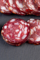 sliced high-quality pork sausage with the addition of lard pieces