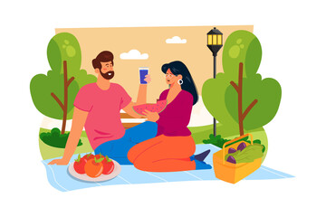 A couple spends the day enjoying the outdoors with a picnic or hike