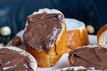 chocolate butter spread on a baguette, close up