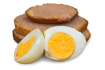 A sandwich made of bread and pate, next to it lies an egg cut in half. Isolated on transparent background.