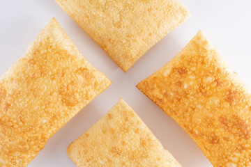 Four Fried Pastels (Pastel de Feira), white background, Top View Concept
