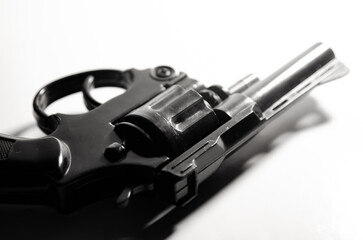 Gun in hand  monotone in crime concept. - obrazy, fototapety, plakaty