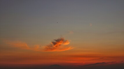 Golden sky in the morning with soft clouds