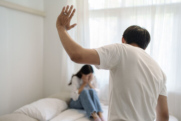 Domestic violence and Family conflict concept, father fighting mother with quarrel at home. - obrazy, fototapety, plakaty