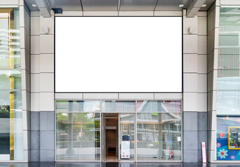 Mock up white background billboard and clipping path on entrance door shopping mall building