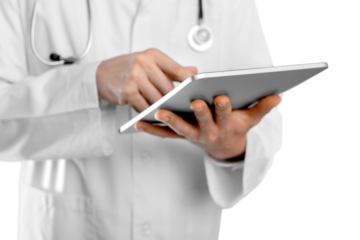 Doctor at hospital working with digital tablet