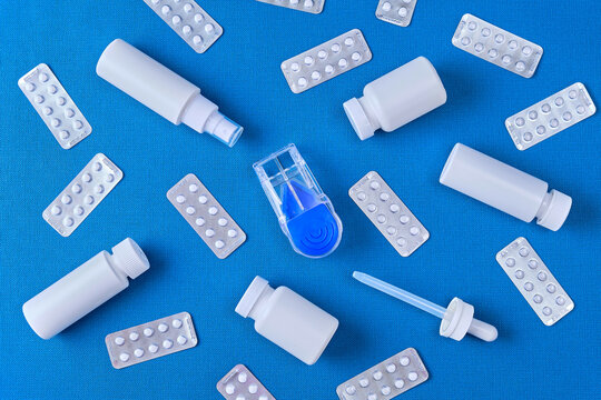 Hair Loss Treatment Medicines on Blue Background