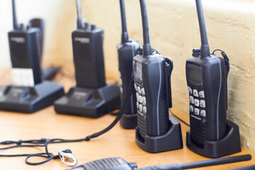 Charge, radio and walkie talkie for communication, equipment and battery with connection. Technology, tools and receiver with transmitter, portable and security with protection, energy and network