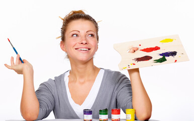 Art, painting and thinking with happy woman in studio with creativity, talent and paint brush for...