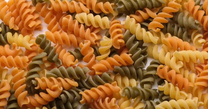 pasta backgroud - macro view of Dry Authentic Italian fusilli