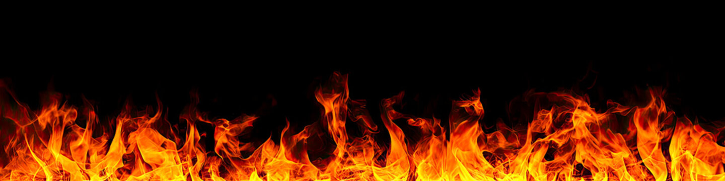 Fire flames on black background. fire isolated over black background. Texture of fire on black background. Abstract fire flame background, large burning fire