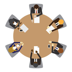 Business people sitting on a round table meeting