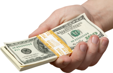 Business man holds stack Paper Currency