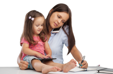 Beautiful business mother is talking on the mobile phone and playing child