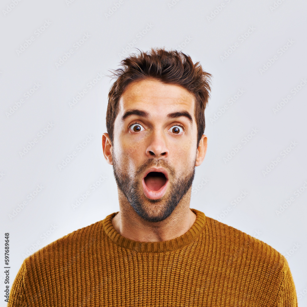 Poster shock, surprise and portrait of a man in a studio with an amazed facial expression or attitude. shoc