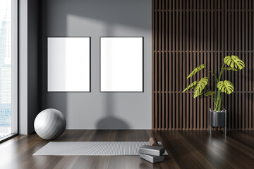 Dark fitness room interior with equipment and decoration. Mockup frames