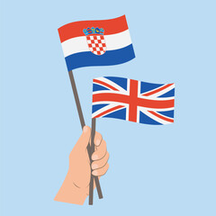 Flags of Croatia and UK, Hand Holding flags