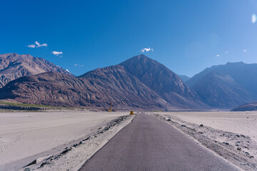 The road, mountain and blue sky, beautiful scenery on the way to Pangong lake, Ladakh, India