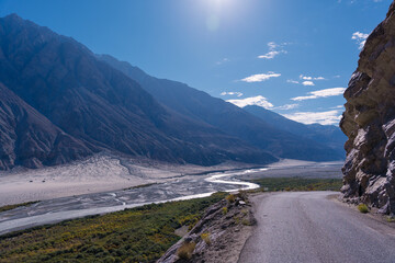 beautiful scenery, the river flows between the foothills of the mountains in the valley at ladakh,...