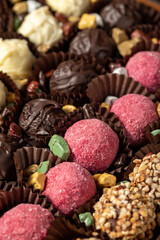 Delicious truffle or praline chocolate assortment. Gourmet specialty chocolate bonbons or pralines. close up