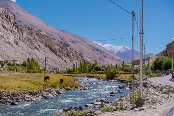 beautiful scenery, the river flows between the foothills of the mountains in the valley at ladakh,...