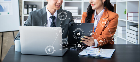 Working team meeting concept, business using laptop and smart phone and digital tablet computer with digital marketing media  in virtual icon network diagram office