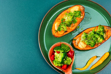 Baked sweet potato with vegetable filling.
