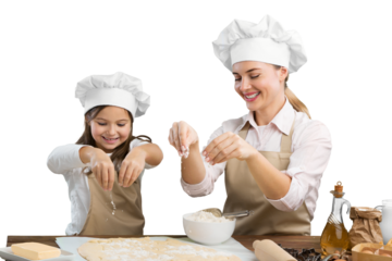The beautiful young mother and her little daughter cook at home